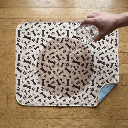 Water soaking into the quilted pad surface without pooling